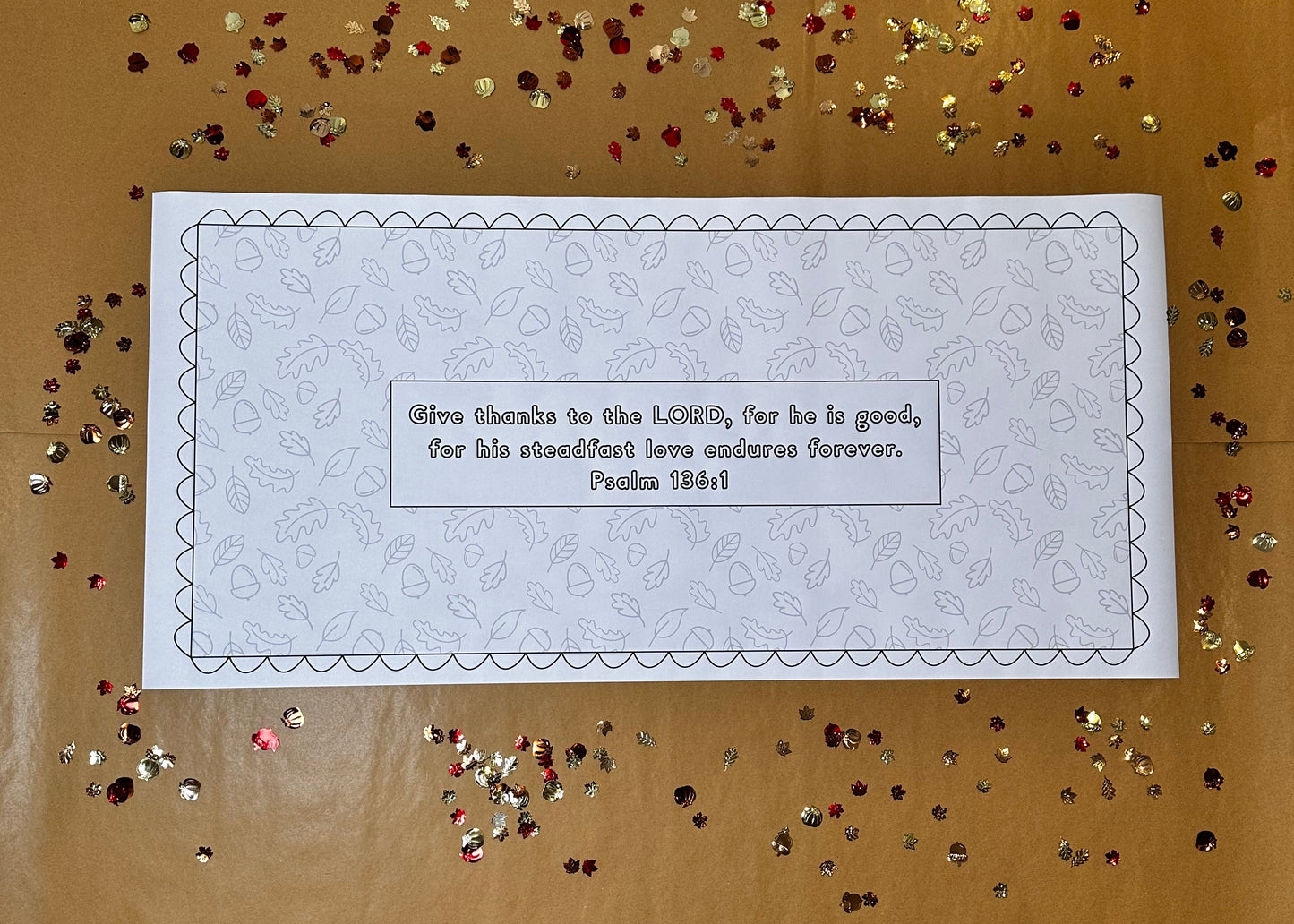 Fall gratitude activity. Thanksgiving activity for families. Gratitude coloring paper banner on a brown background with fall confetti.