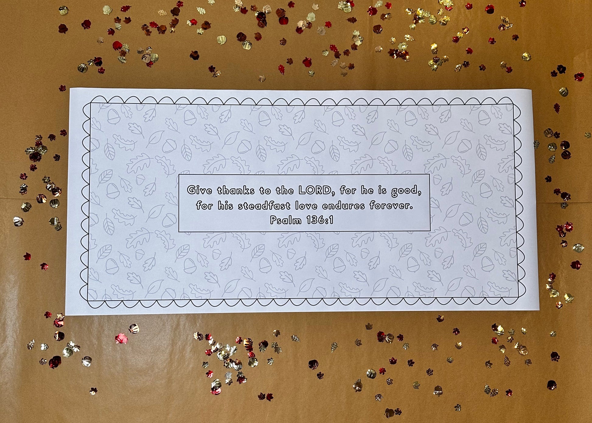 Fall gratitude activity. Thanksgiving activity for families. Gratitude coloring paper banner on a brown background with fall confetti.